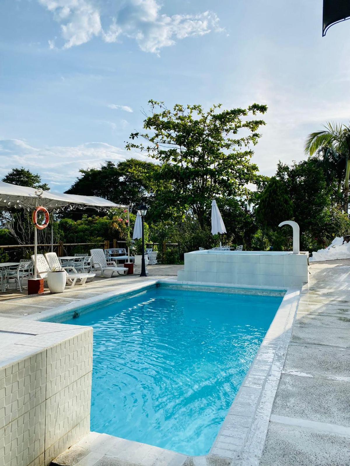 Hotel West California Puerto Espejo Bagian luar foto