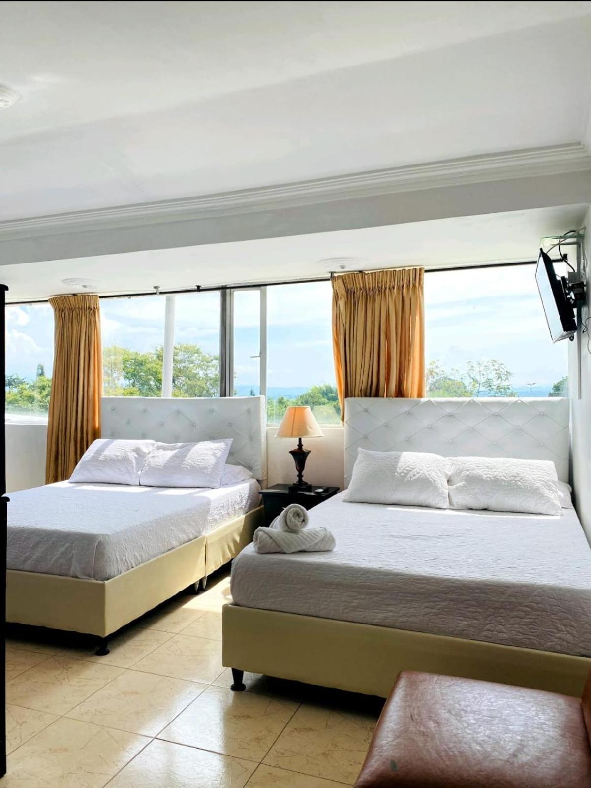 Hotel West California Puerto Espejo Bagian luar foto